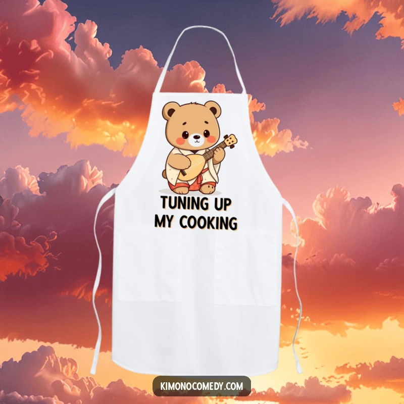 Funny kawaii bear in a kimono playing a shamisen, designed on a kitchen apron, combining humor and Japanese musical elements.