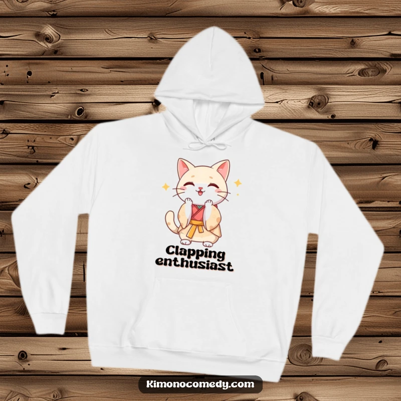 Funny Kawaii cat in a silk kimono clapping paws energetically, soft and warm hoodie for comfort and a celebratory feel.