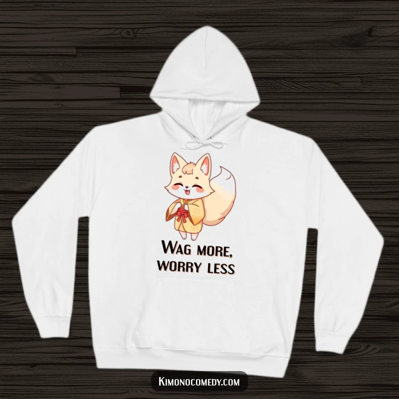Funny Kawaii Kitsune Hoodie: A cheerful, multi-tailed fox in a kimono laughs heartily, its tails expressing pure, wagging joy.