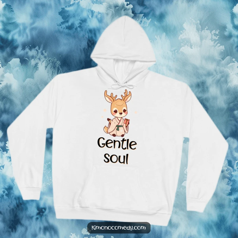 Funny deer hoodie showcasing a gentle creature in a serene kimono, offering a small gift with a heartwarming smile.