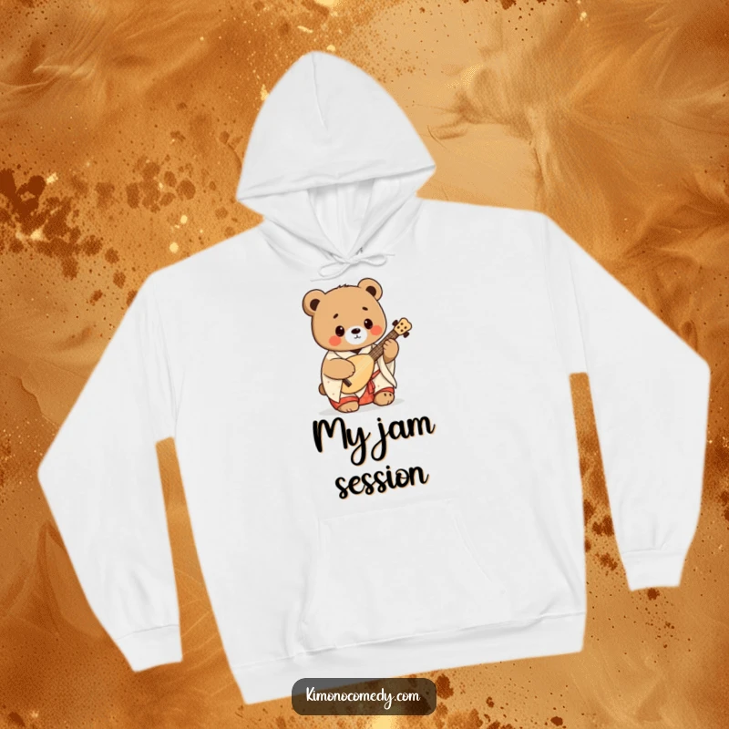 Funny kawaii bear in a festive kimono playing a shamisen, depicted on a cozy hoodie, bringing fun and Japanese flair.