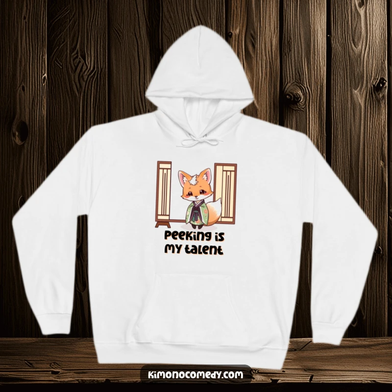 Funny hoodie featuring a fox in an elegant kimono playfully peeking from behind a paper screen, offering cozy comfort and mysterious humor.