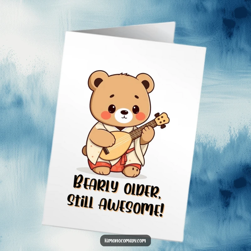 Funny free printable birthday card with a Kawaii bear in a kimono playing a shamisen with gusto.