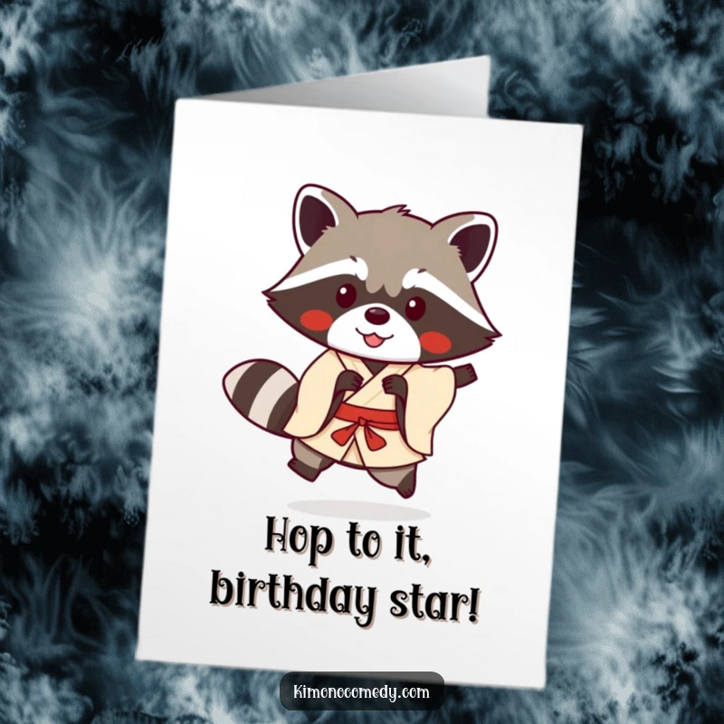 Funny free printable birthday card featuring a cute Kawaii raccoon in a kimono doing a happy, playful hop.