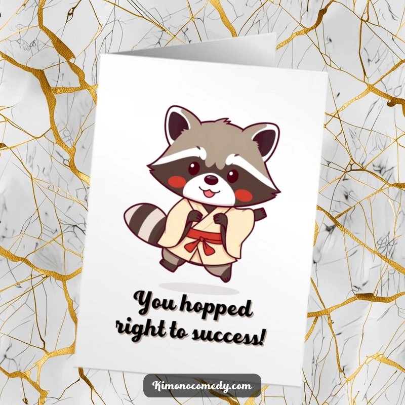 Funny free printable congratulations card showing a Kawaii raccoon in a kimono doing a joyful, playful hop.