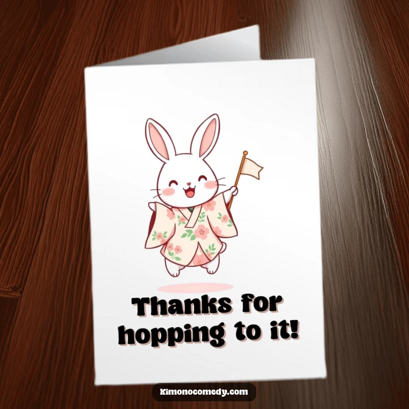 Funny Free Printable Thank You Card: A rabbit in a floral kimono hops excitedly, waving a flag saying thank you.