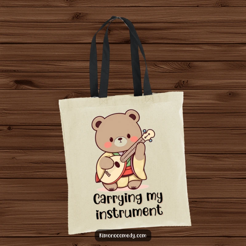 Funny Kawaii Bear Tote Bag: A tote bag featuring a bear in a kimono playing a shamisen, perfect for carrying music gear.